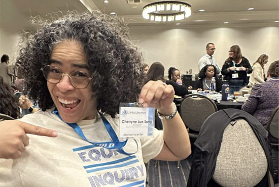 A group of educators in discussion at a table during a CRLP event